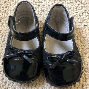 Pair of black Pediped shoes